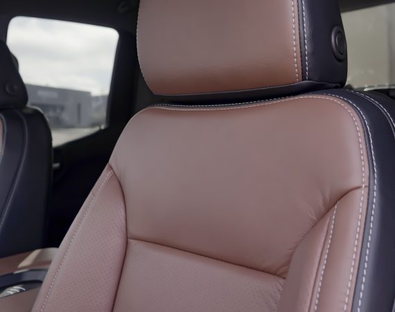 Black leather - Mahogany face with perforated combo style inserts and silver contrasting stitch with Degreez Heated and Cooled seats
