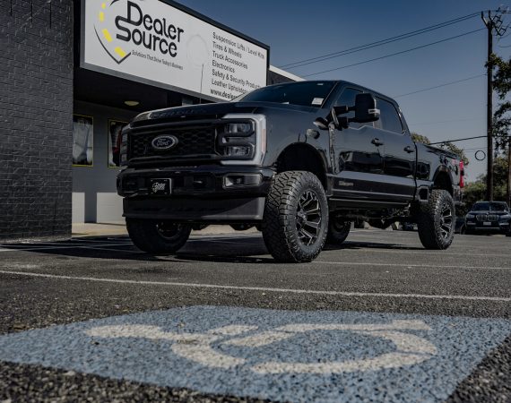 2023 Ford F-250 -Rough Country 3 inch Lift Kit -Wheels- Fuel D576 Assault Size: 20x10 -Tires-Nitto Ridge Grappler -Amp Steps -Black Katzkin Leather with Diamond Lunar Grey inserts, Lunar Grey Wings, & a Lunar Grey Seam