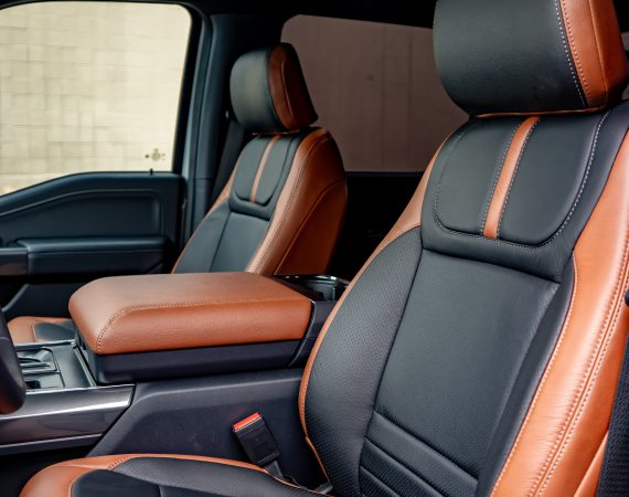2023 F-150 Super Crew - Mahogany leather with a Black Center, Perforated Inserts, Black Perforated Wings, and Lunar Grey Stitching Reference 99441